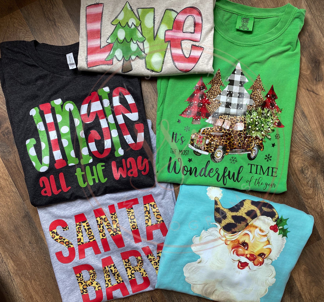 Suprise Christmas graphic tees